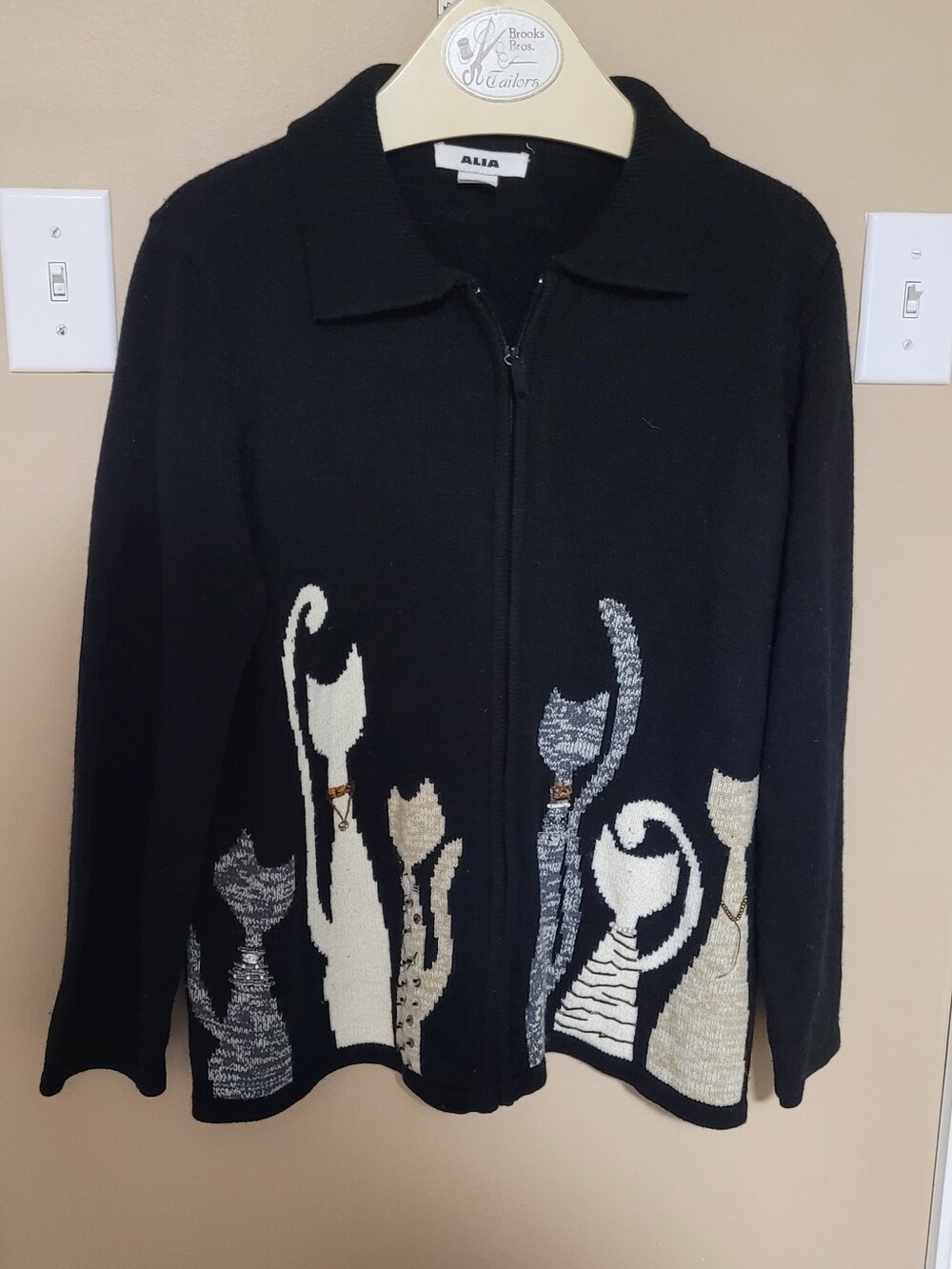 💚10 for $10💚 Bundle and save Alia Black Zip-Front Cat Motif Sweater